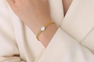 Luxe 14k vergulden armband patroon + hart bedel