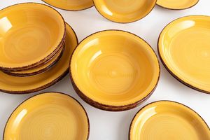 Quid 18-delige bordenset geel (collectie: Vita)