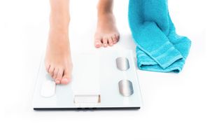Pèse-personne avec mesure de la graisse corporelle